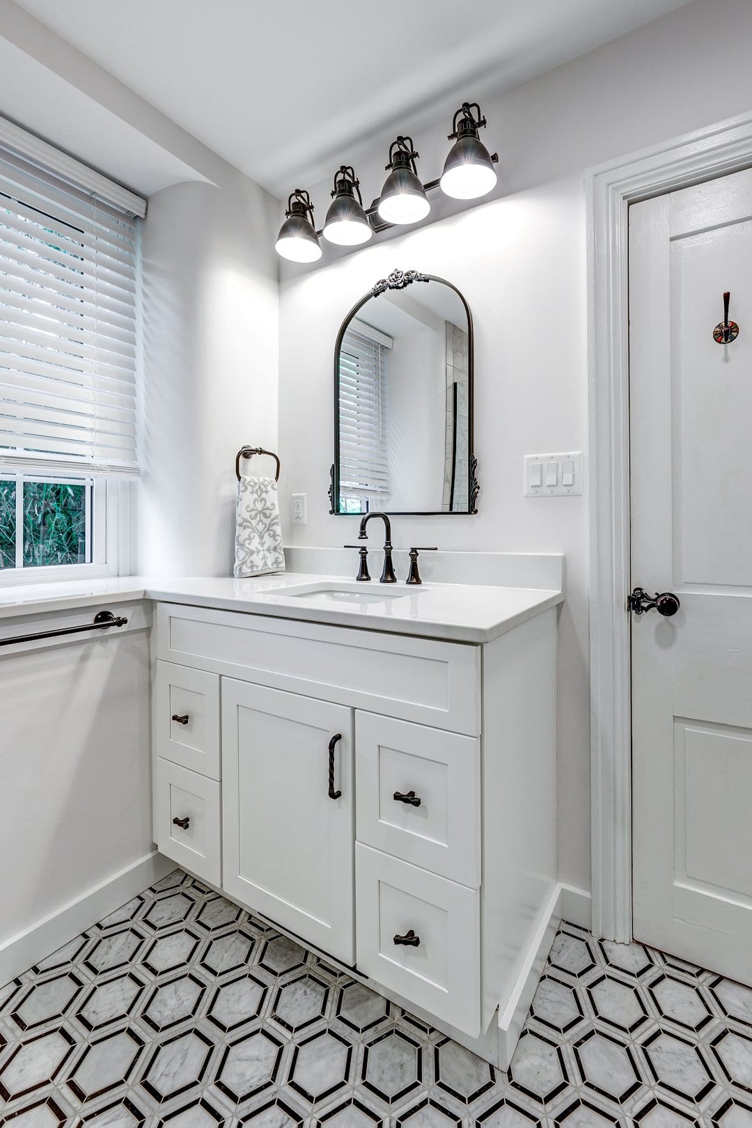 Farmhouse bathroom renovation with modern tile